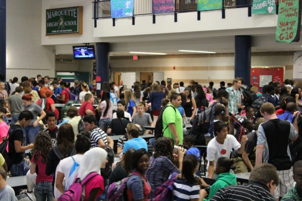 Students wait in the Commons before school starts on Monday, Aug. 27.  Students werent allowed to go into the hallways until 8:30 a.m.