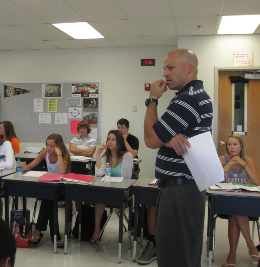 Blake Johnson, language arts teacher, instructs his 10th grade language arts class.