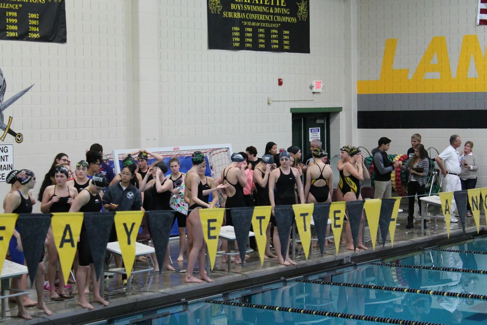 Girls+swim+competes+at+Conference
