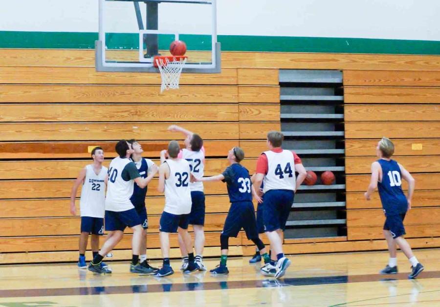 The Marquette High School Boys Basketball team in a pre-season practice.