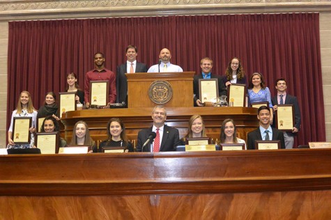 The winners, (top) Hannah Otto for equality, Tara Willey for temperance, Megan Clasen for law, Anthony Washington for progress, Kellan Murray for liberty, Samantha Bayne for truth, Eryn Bass for knowledge, and Andy Heller for fraternity. (Bottom) Whytney Clay for justice, Courtney Karl for honor, Lindsay Bass for education, Lucy Tuholske for charity, Gracen Seim for virtue, and Jacob Kauppila for enterprise, pose with their awards. Photograph printed with permission from Lucy Tuholske