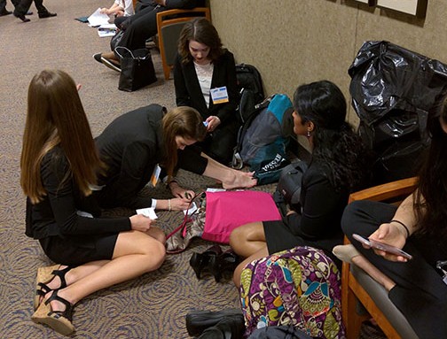 MHS students sit down to study before their competition. The students pictured, Ramya Palaniappan, senior, Emma Bruere, junior, Lauren Milburn, senior, and Emily Saxon, junior, placed 1st in their event, Medical Innovation.