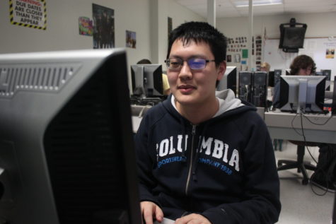 Jerry Zhang, junior, sits in his AP Computer Science class. Zhang has qualified for both the Physics and Chemistry olympiads.