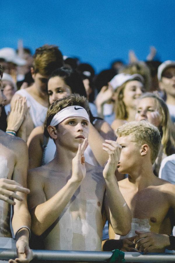 Mitchell McCandless, senior, shows his school spirit at a MHS football game. McCandless is the leader of Stang Gang, a group composed of 30 students that focuses on school spirit during sports games.
