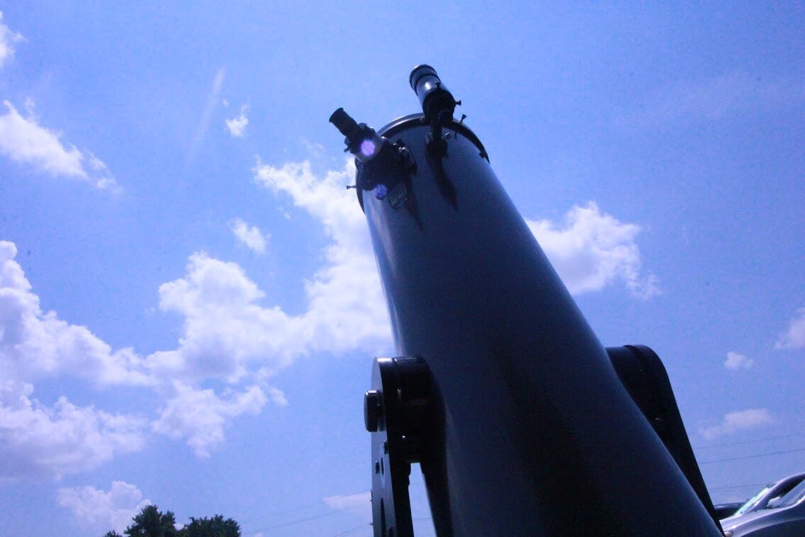De Soto residents set up a telescope across from De Soto Public Library to observe the progress of the eclipse.