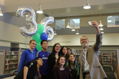 Superintendent Dr. Eric Knost snaps a selfie with the nine students who scored a 36 on the ACT: Jacob Besch, William An, Michelle Li, Rachel Pang, Sriya Kosaraju, Michael Wu, Brooke Davis and Sydney Ring. 