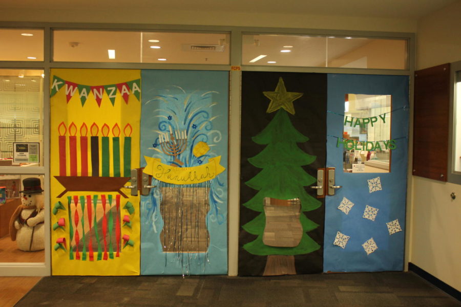The library doors decorated for winter holidays. 