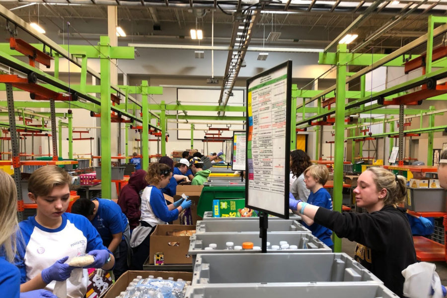 Working in the Houston Food Bank, students pack bags with water and food for those hurt by Hurricane Harvey. Students spent hours making care packages for those affected by the hurricane. “The work was long and hard,” Andrews said. “But in the end, it was totally worth it.”