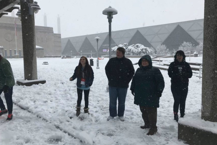 Ali Nuckles, sophomore, (on the left) marvels at the snow last Saturday in Kansas City. Because the MHS Thespians were snowed in, they kept themselves entertained with snowball fights and other social events. 
