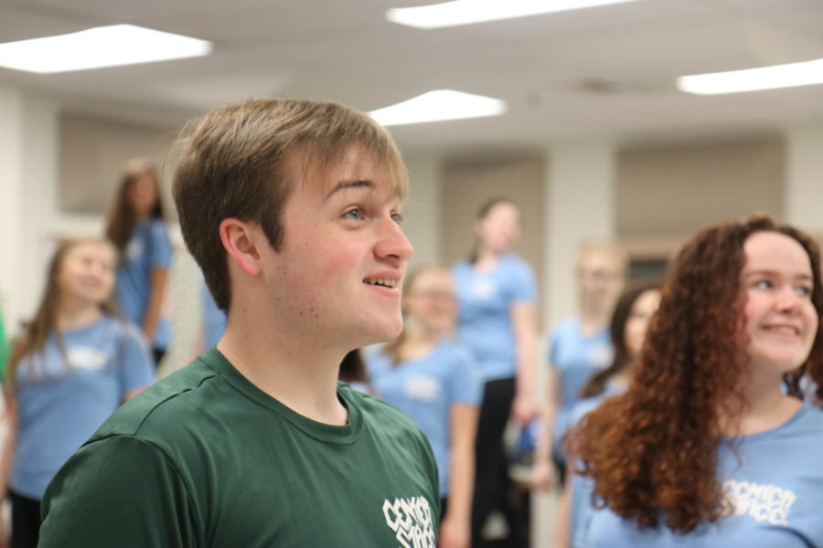 During show choir class, David Pisoni, junior, practices his routine for his upcoming competition. “Third place is definitely a good place for our competition and I think we are really excited with it,” Pisoni said. Show Choir has back-to-back competitions these next two weekends.
