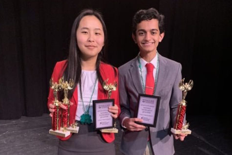 Senior Rachel Pang and freshman Jesh Gandhi pose with their awards after winning first in public forum debate at the Eastern Missouri NSDA Districts Tournament on March 10. This year five MHS students qualified for Nationals, which will be held in Dallas during June 16-21. 