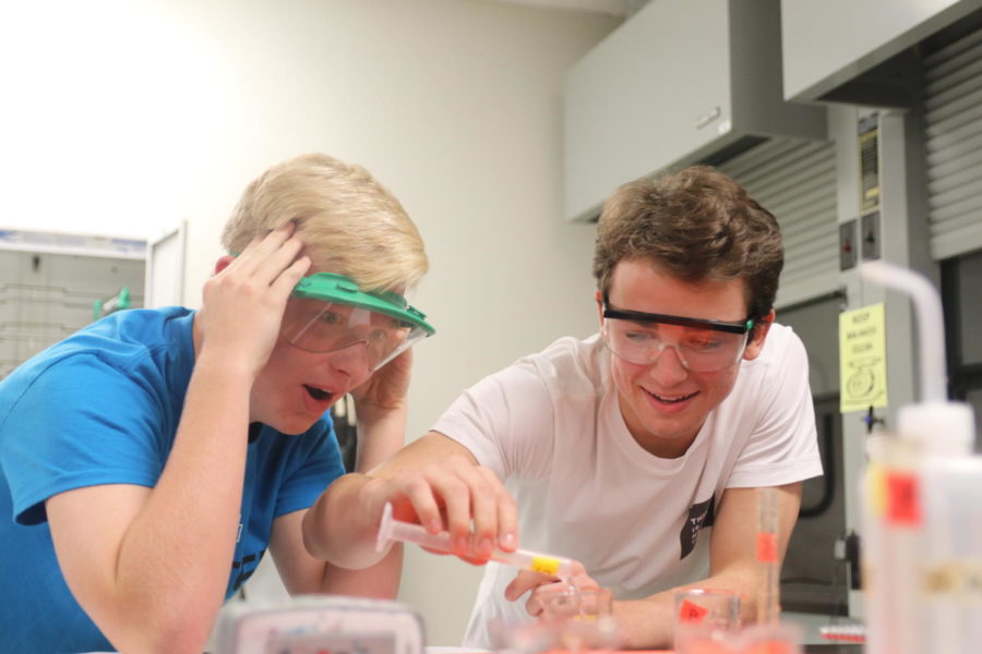 Sophomores Sean Van Rems and Christian Springer participate in a lab in Cathy Robertson’s fifth hour
Chemistry class. It was the first lab of the year and their first interactive experience in the class. “I am a
more hands on learner,” Springer said. “Rather than sitting in class, I like being in the lab.”