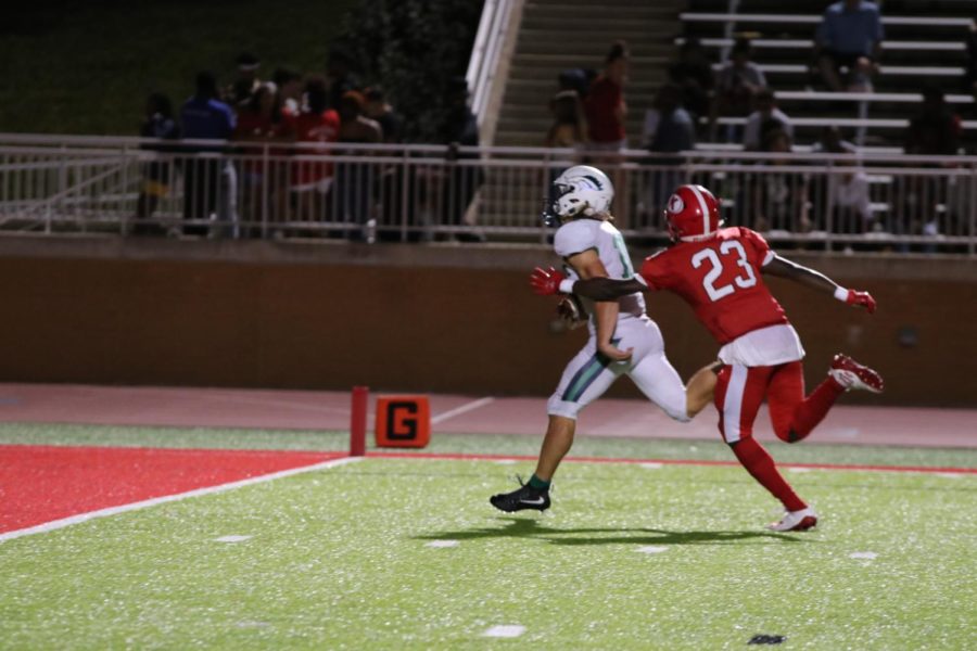 Chris Kreh, junior, runs into the endzone during the fourth quarter of Friday’s game against Kirkwood High School. Kreh is the St Louis area’s leading touchdown scorer with 11 touchdowns.