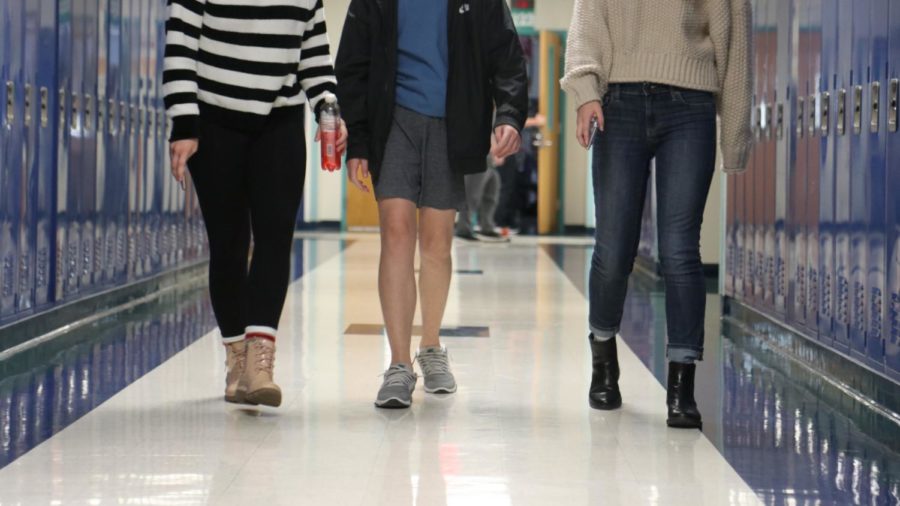 Students walking in the MHS halls.