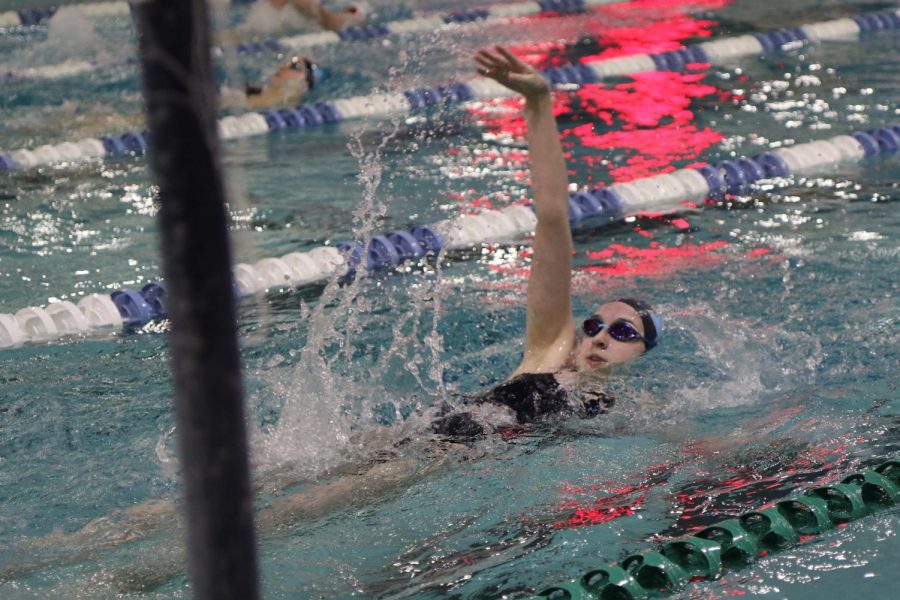 Jenna Howard, junior, swims in the 200 individual Medley in her match against Eureka, January 13. She would finish third of eight and help the team win 127-59.