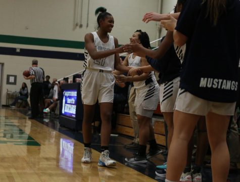With little time left in the game, Love Troupe, Senior, is called out of the game to get her final applause. “It’s bittersweet, but I’m glad I was able to have the career I had,” Troupe said. Troupe scored 7 points on 5 shots and had 4 defensive rebounds in that game.
