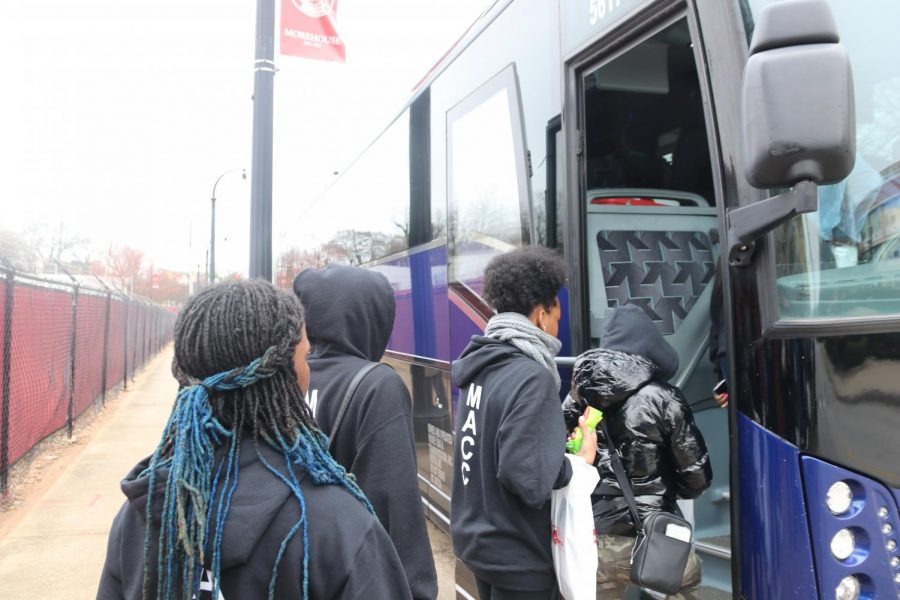 Boarding the bus, juniors Nykieta Alexander, Aliyah Edwards, Amber Smith and senior Kaliah Rodgers prepare to depart from a tour of Spelman University and Morehouse University. Members of the Marquette Academic Cultural Club (MACC), alongside students from Kirkwood and Webster Groves, attended a college trip in Atlanta to tour local universities, dine at local eateries and meet new people from February 13-18. 