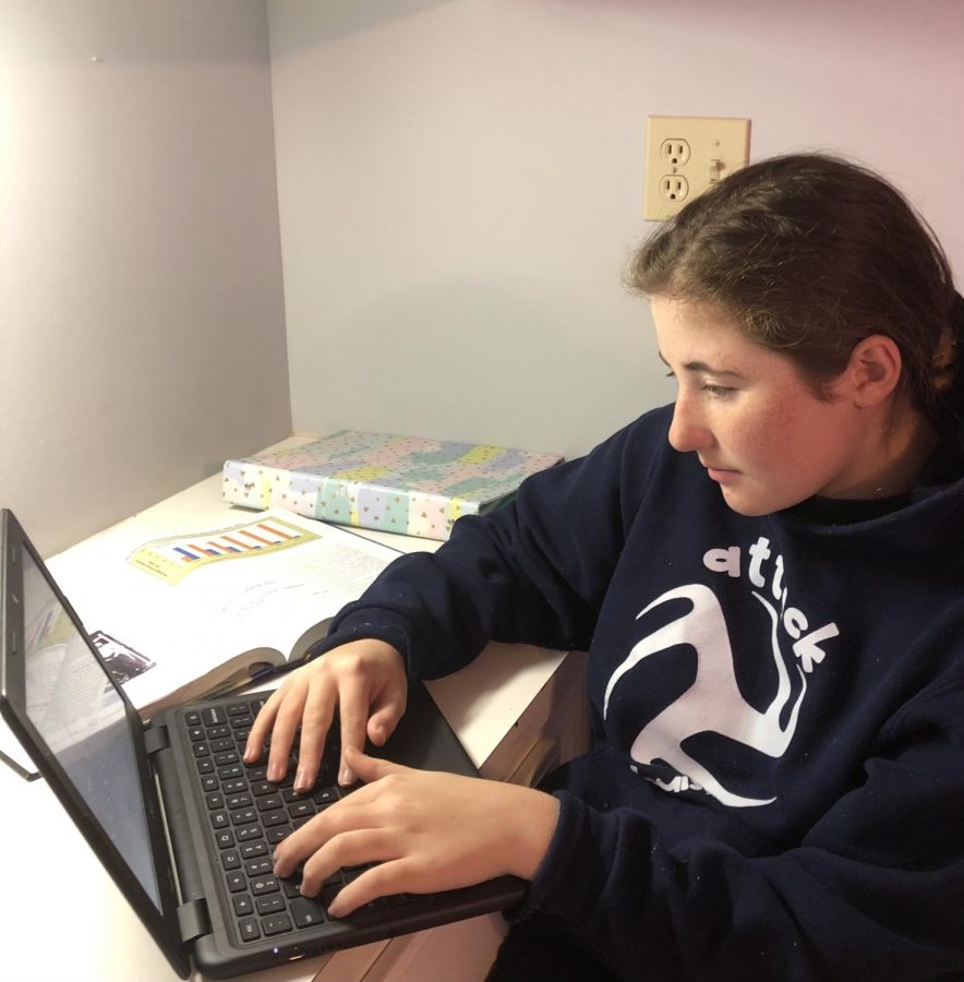Ella Notestine, freshmen, completes her school day at her desk. Its hard to judge [the MHS high school experience] based on four hours of looking at a chromebook, Notestine said.