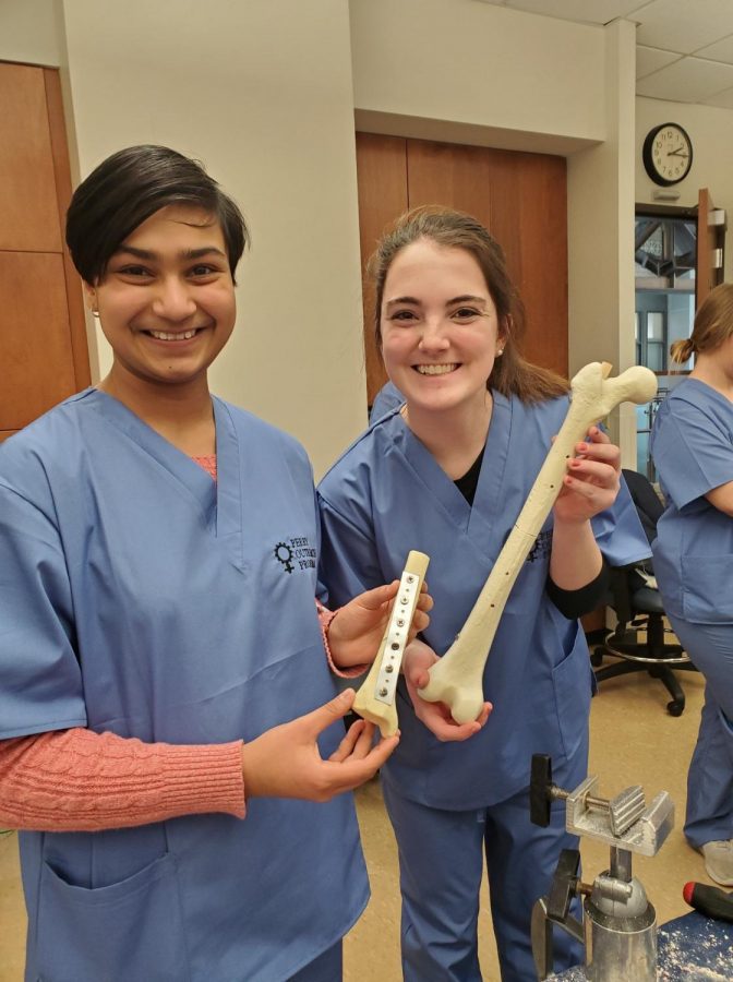 Senior Amanda Eshelman [Anisha Jarang on the left] participated in Perry Initiative Program at WashU in which they hosted a series of events encouraging girls to pursue careers in Orthopedic Medicine and Engineering which is a profession that is only 6% women. Eshelman said this program inspires her to combine her interest in healthcare and computer science. She said was amazed at the process of using technology in orthopedic surgery to place screws and visualize joint replacements.