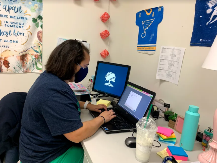 Megan Fink, language arts teacher, creates assignments through Canvas for her language arts students who are fully virtual.  