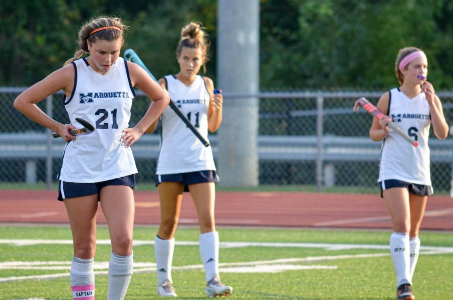 Seniors Kenzie Petch (left) and Emily Warren (right) walk off the field at the end of the fourth quarter. The Mustangs played the Kirkwood Pioneers to a 1-1 tie but would lose 2-1 in overtime.