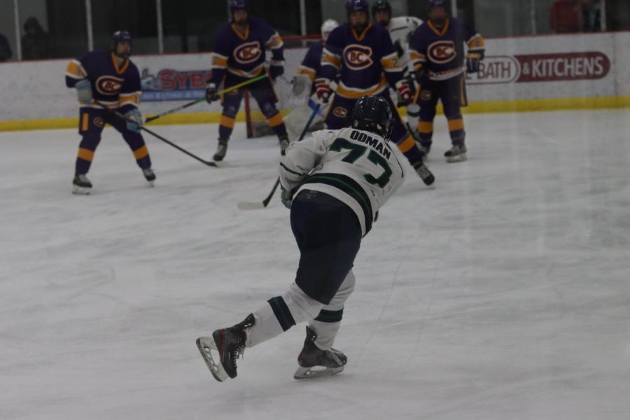 Sophomore, Bradley Odman, defenseman, shoots the puck from distance through multiple CBC defenders. The mustangs fell to the Cadets 3-0 on Monday, Nov. 8.  