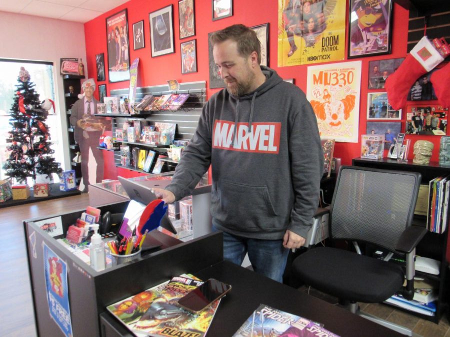 Brandon+Forrest%2C+owner+of+local+comic+shop+Altered+State%2C+opened+in+October.+Forrest+said+that+Spider-Man+has+sold+over+218+comics+in+the+last+two+months.+