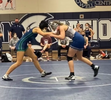 Rebecca Strong in a match with a girl wrestler from Francis Howell Central, in last year tournaments. Since the wrestling practice begin this year,  there has been a large growth of new girls joining the girls wrestling team. 