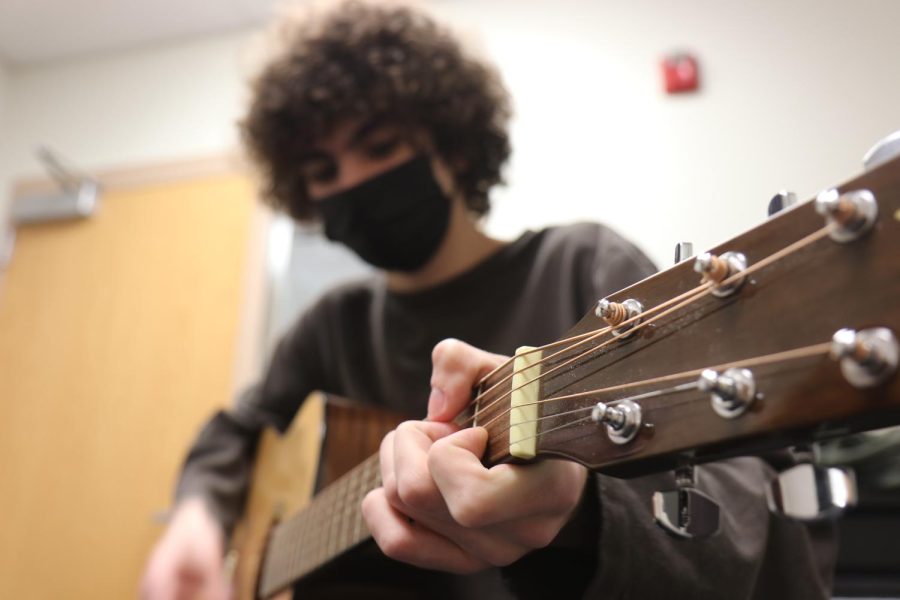 Jonathan Pirrello, sophomore, often spends Ac Lab practicing guitar.