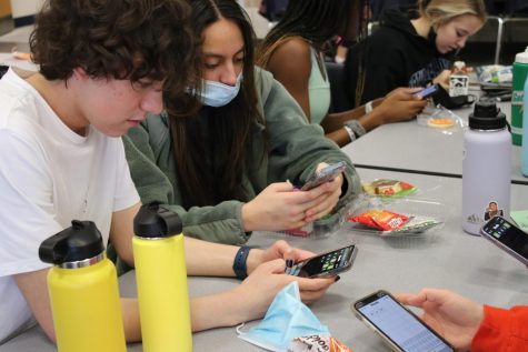 Juniors Collin Durer and Priya Leckliter play Wordle and Taylordle during their lunch. Students all over MHS have taken to making Wordle a part of their daily lives and often use their free time during the day to play the game. 