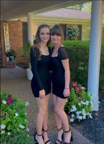 Graci Francis (right) and Gracie Francis (left) pose for a picture before heading off to homecoming on Sept. 25,. Gracie was adopted by Gracis family in 8th grade, where they started facing problems because of their similar names. “It can be really annoying sometimes, especially when its obvious that they are trying to talk about the other one, but they keep talking about the one that they are talking to.” said Graci. 