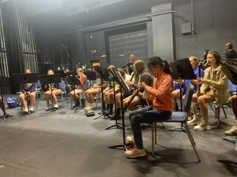 Symphonic Band practices during sixth hour. Some students in the class are involved in Marching Band and will be assisting during the craft fair on Saturday.