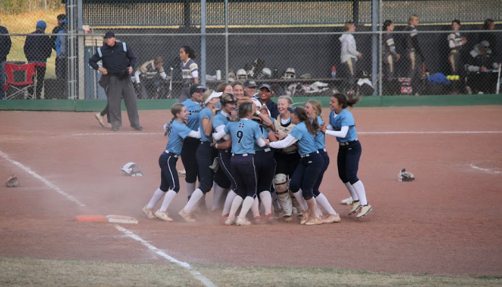 Varsity+Softball+celebrates++their+win+against+Lindbergh+High+School+in+the+MSHSAA+State+Quarterfinal%2C+effectively+putting+them+in+the+top+four+qualifiers+for+State.+