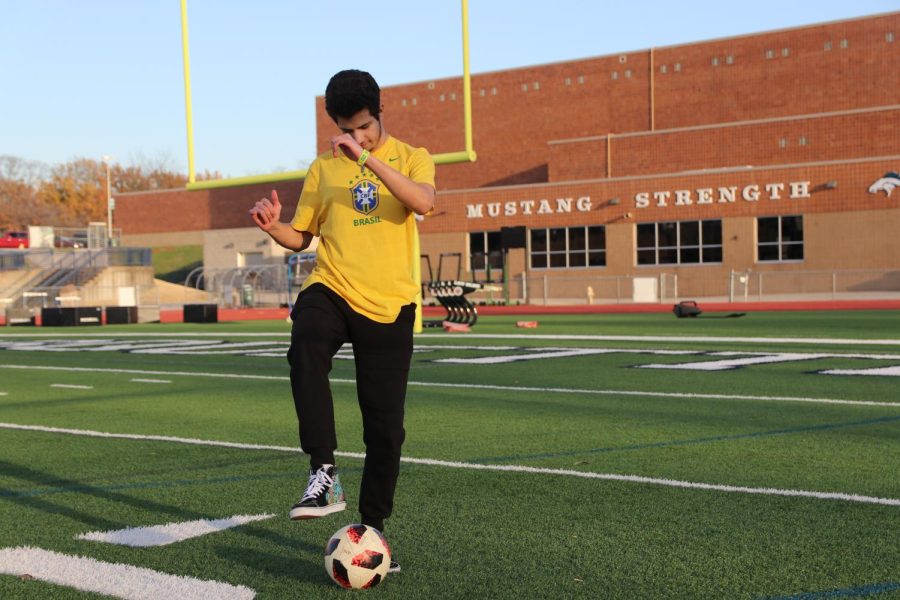 Lucas Tourinho, sophomore, practices his footwork skills with the ball. Tourinho is very passionate for the Brazilian national team because of the teams composition. Brazil is great. Their teamwork, Alisson Becker, Fábio Henrique Tavares, Neymar, theyre all great, Tourinho said.