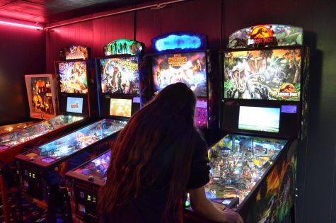 Haley Huber, sophomore, plays pinball at West County Pinball where she first started playing competitively. 