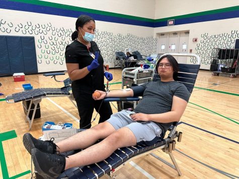 Sean Kee, Senior, gets his blood drawn at the annual blood drive on April 12. 