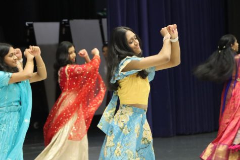 Samvida Batchu, sophomore, performs Bollywood dancing with
her friends in the Commons for the Festival of Nations.