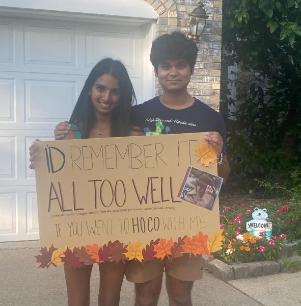 Lafayette junior Aditya Pall asks Anishka 
Bhatia, junior, to Homecoming with a Taylor Swift inspired sign. This year the MHS and Lafayette Homecoming dances are on the same night. 