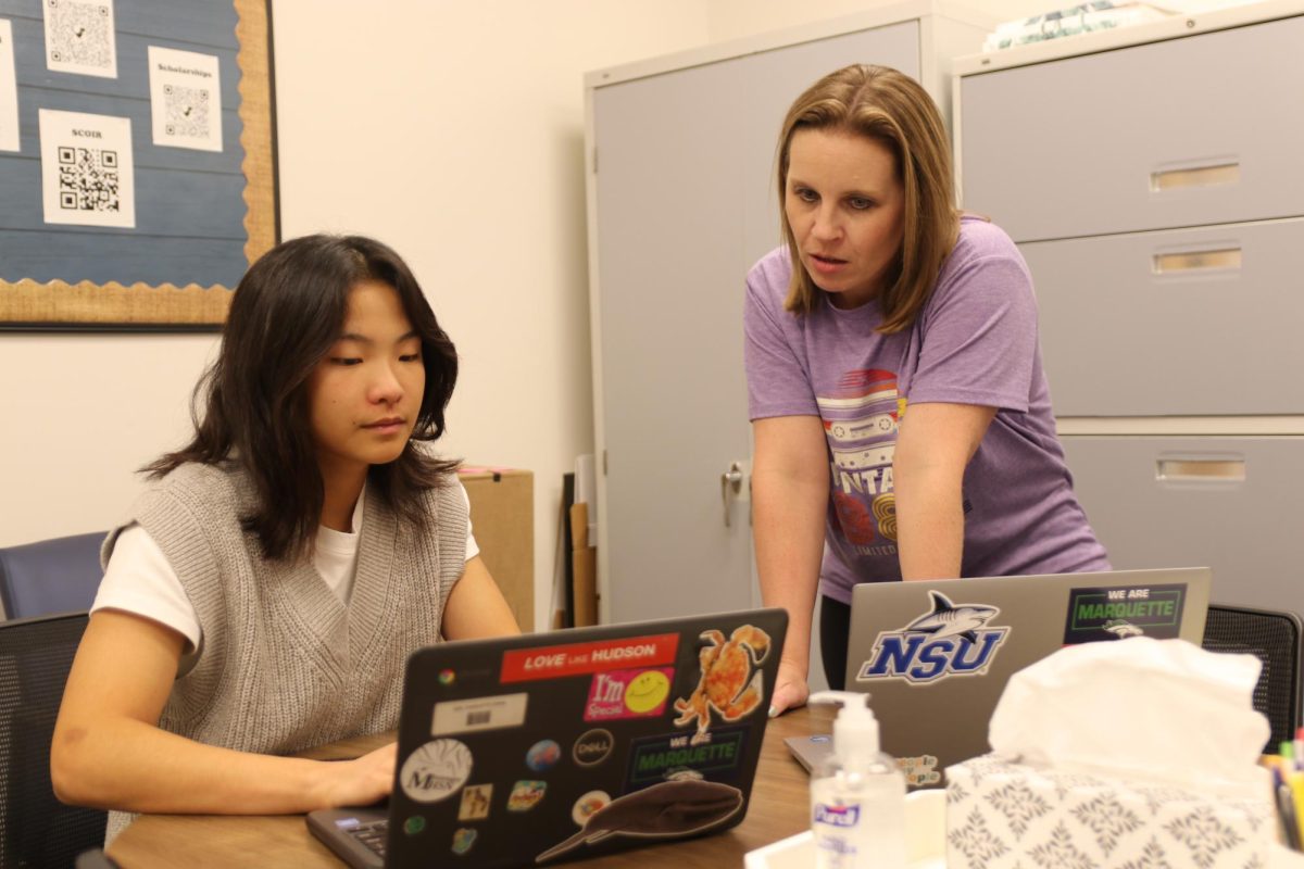 Charlotte Qin, senior, met with Paula Ake, college and career counselor, during seventh hour on Tuesday, Sept. 19, to ask questions about sending transcripts to colleges. Students can also meet with college counselors during Ac Lab.