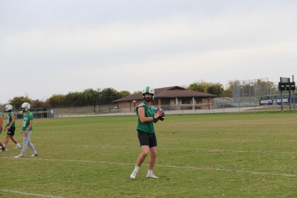Sophomore Caden Throneberry looks to make a pass during practice on Oct. 24. With Districts quickly approaching, Throneberry said, If we do what were supposed to, we will make a good run in the playoffs.