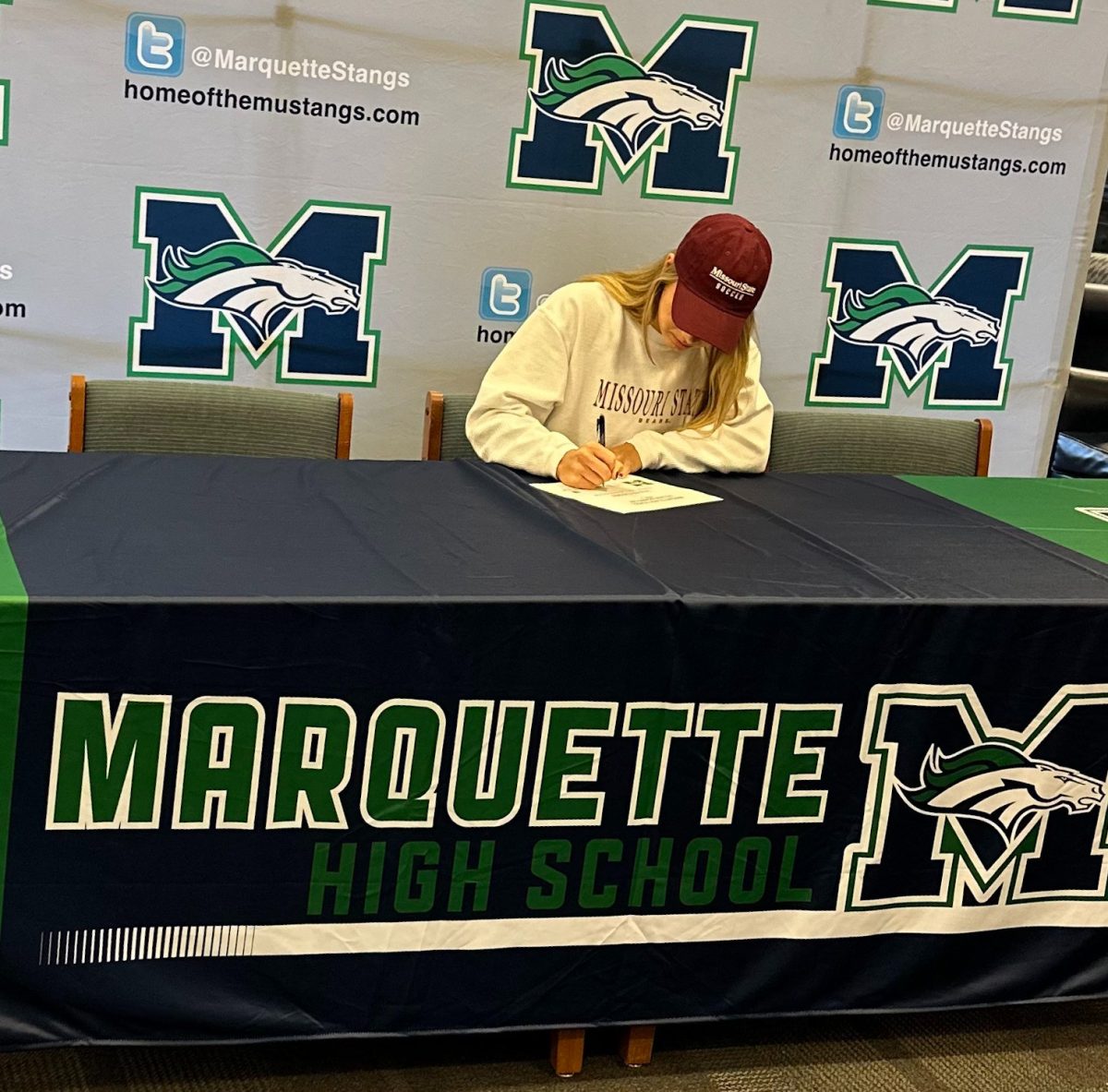 Bri Kappeler, senior, signs a contract, which officially seals her commitment to the soccer program at Missouri State.