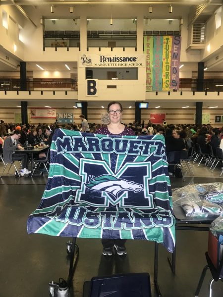 Kara Zonies, Student Council sponsor,  is selling the blankets at lunch for students to buy.