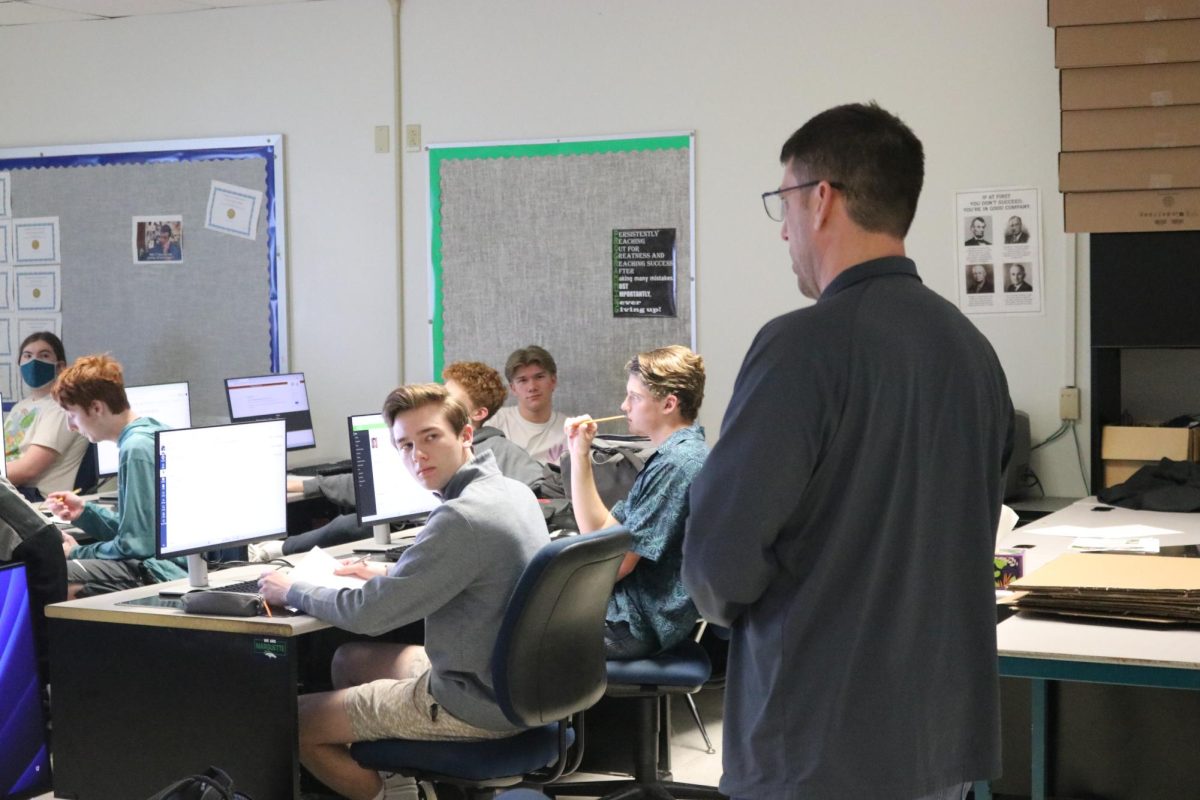 Nathan Frankenberger, computer science teacher, educates students during a Cybersecurity class, a new course offered this year. 