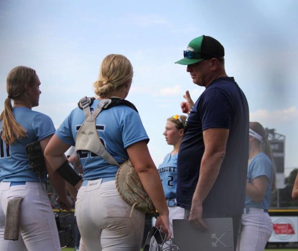 Aubrey Watson and Meyer meet in a huddle at the mound during a District game in the 2022 season.
Photograph by Amanda Watson
