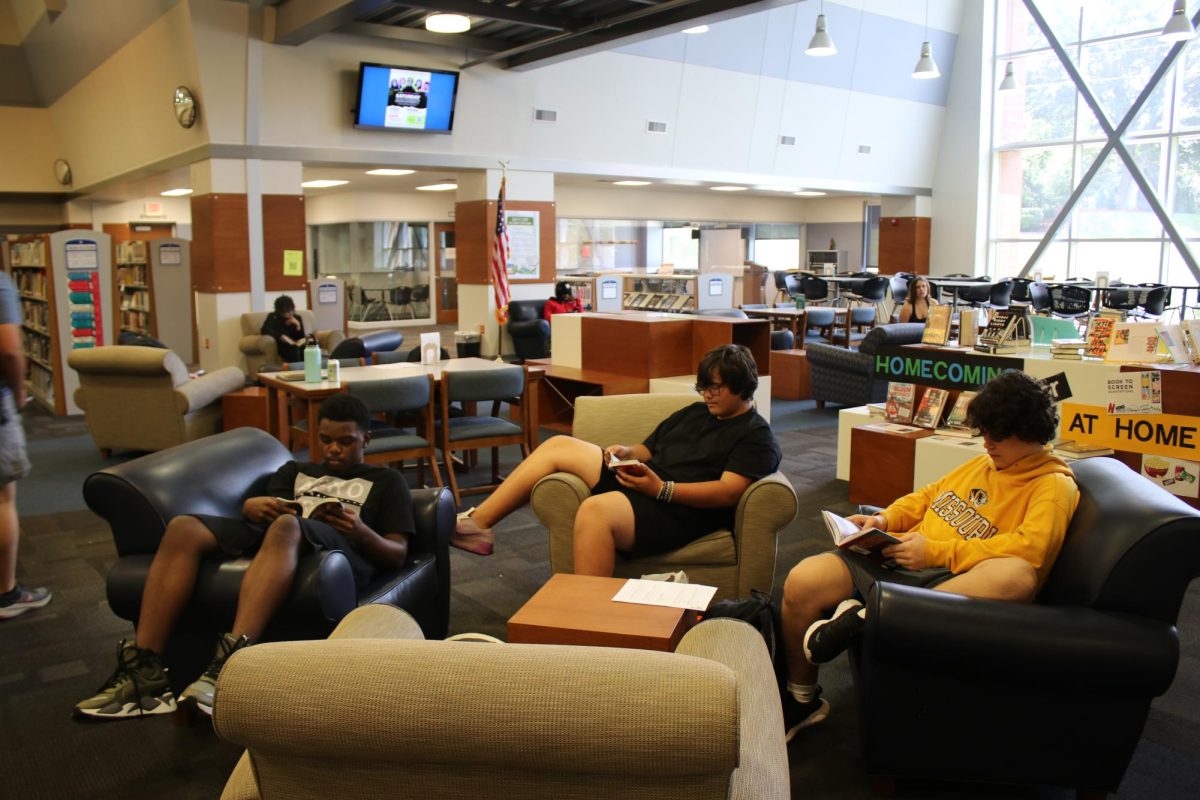 Students in Katie Denney’s 10th Grade Language Arts class read in the library. As part of the school’s efforts to focus on literature, the library is reserving time slots for Language Arts classes to visit the library to read and check out books. 