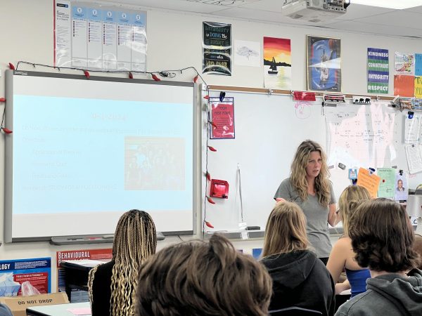 Ashley Hobbs, AP Psychology teacher, engages with students during a class lecture on Wednesday, Sept. 4. Hobbs said students and staff are having to retrain their circadian rhythms as they continue adjusting to the early mornings and general busy-ness of school, so she tries to be loud, engaging and get people moving during class, as well as utilizing repetition, to improve focus and memory.