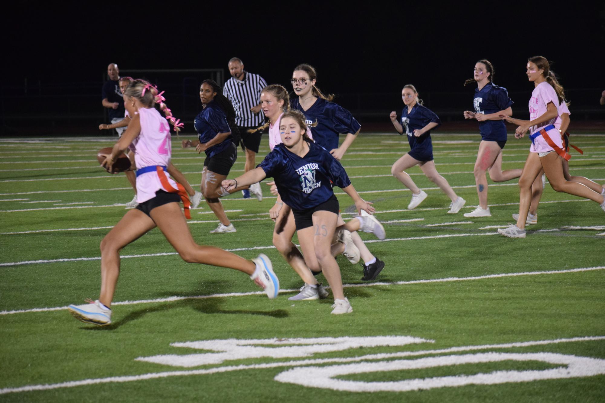 Senior Women Defeat Junior Women in Flag Football