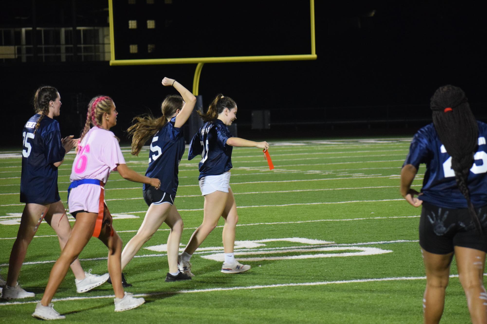 Senior Women Defeat Junior Women in Flag Football