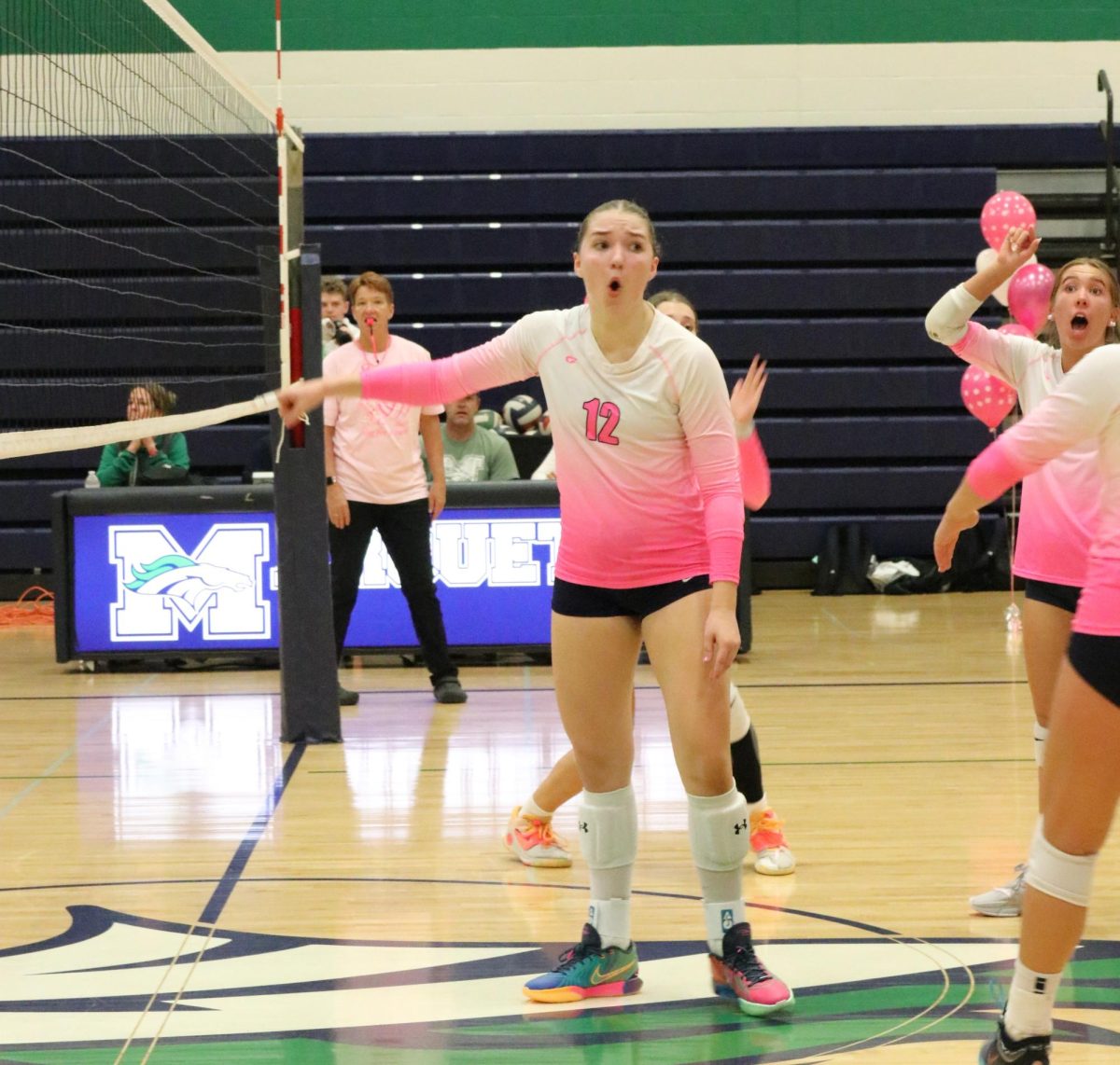 Teagan Pocius, junior, celebrates after blocking a ball during MHS' pinkout game against Lafayette on Tuesday, Oct. 1. Pocius broke the all-time block record on Tuesday Sept. 14.