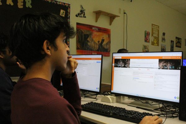 Aryan Valsa Pradeep, senior, looks at his UChicago status profile on SchoolLinks. Valsa Pradeep accidentally requested a recommendation letter from his internship advisor in the teacher section, and after the letter got submitted Valsa Pradeep was unable to change it. "It just gives me one last spot for an additional letter," Valsa Pradeep said.